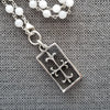 WHITE ONYX (6MM) NECKLACE WITH FLEUR D'ISLE CROSS-24"